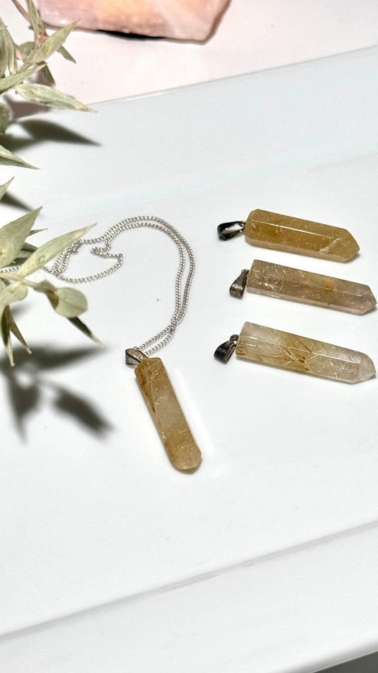 Golden Rutile pendants - The Crystal Therapy