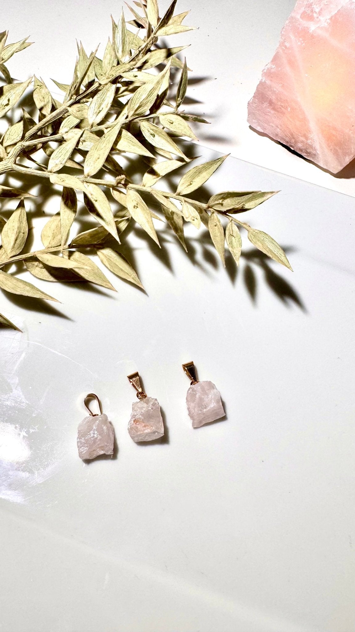 Rose Quartz pendants rough - The Crystal Therapy